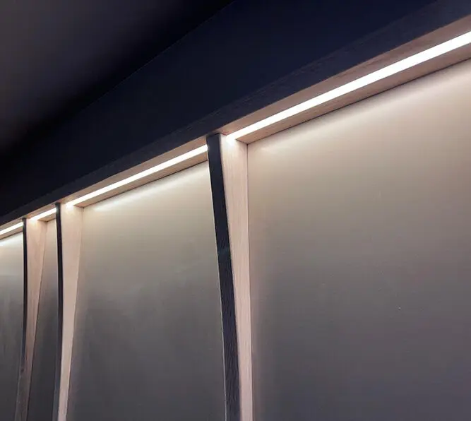 Wall panels with integrated LED light lines